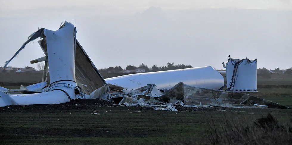 A damaged wind turbine after it crashed to the ground on January 1, 2018 in Bouin, western France, during heavy winds caused by storm Carmen.