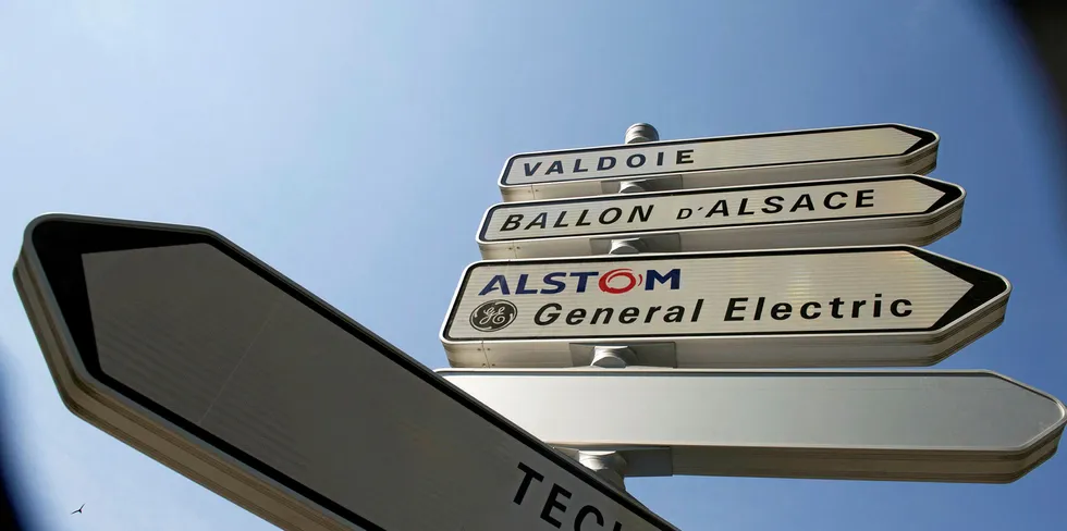 A photo taken in Belfort shows road signs indicating directions for deliveries to French power and transport engineering company Alstom and US conglomerate General Electric (GE).