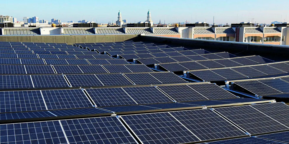 Solar rooftops on newspaper building at Berlin's Franz-Mehring square