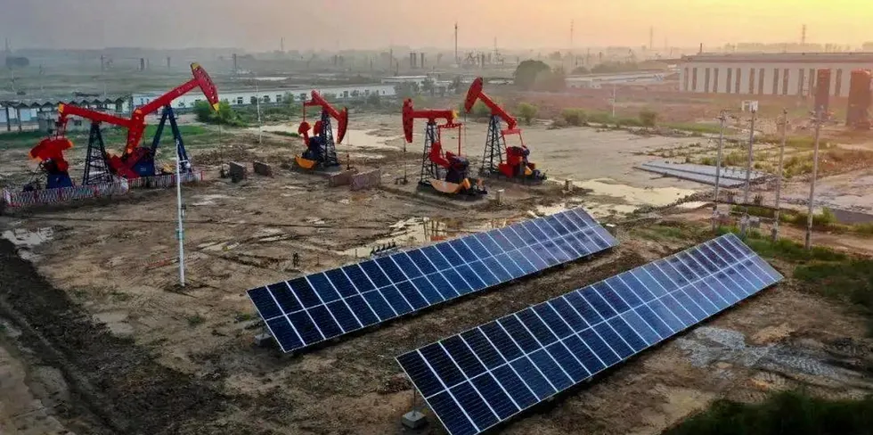 Old and new: a Sinopec photovoltaic plant sits alongside an oilfield