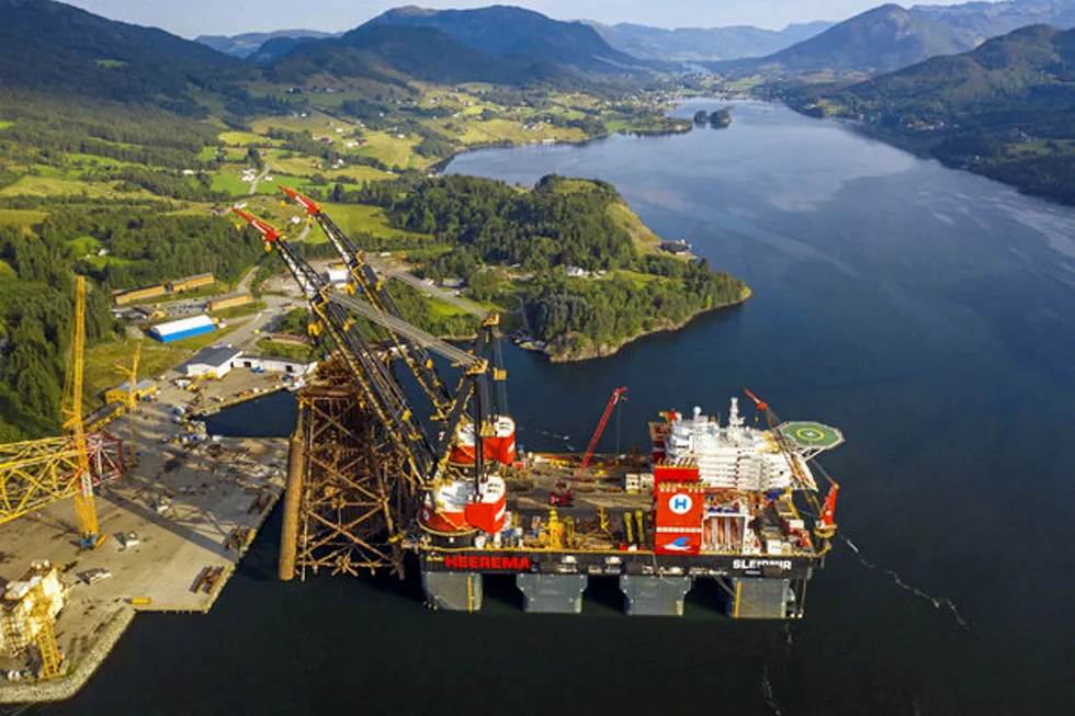 Arrival: Sleipnir offloading the jacket onto the quayside at the AF Miljobase decommissioning site in Vats, Norway on 11 August