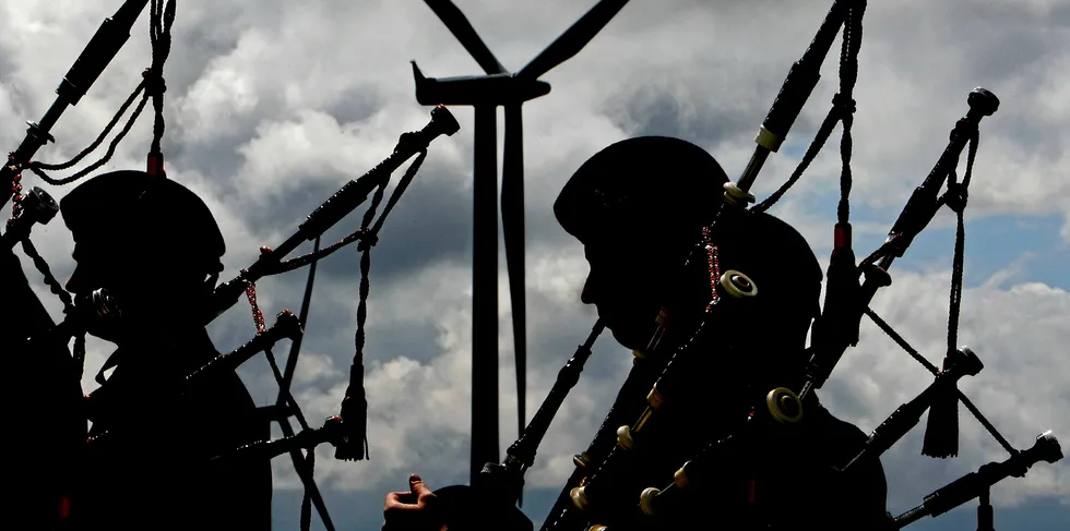 Pipers play at Iberdrola's Whitelee windfarm.