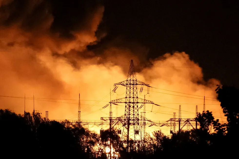 Escalation: A fire raging at the heat and power plant TETS-5 in Kharkiv in northern Ukraine after it was hit by a Russian missile on 11 September.