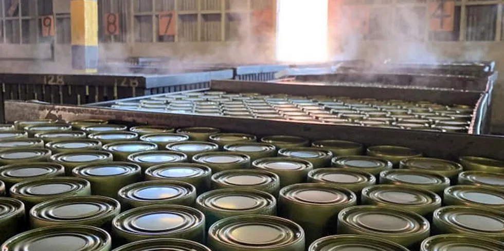 Canned salmon stored in OBI Seafoods' Larsen Bay facility in Alaska. The company was awarded a massive USDA bid in January.