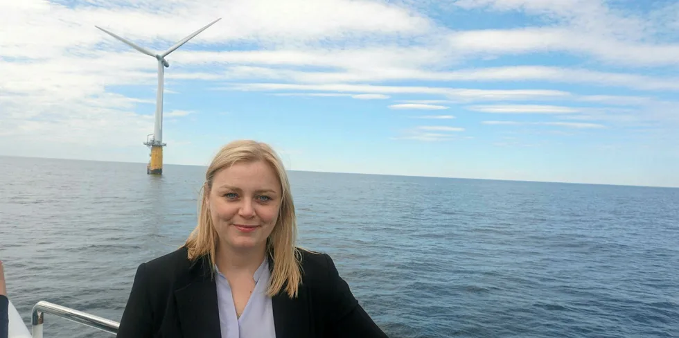 Norwegian energy minister Tina Bru, in front of the Hywind Demo floating wind pilot