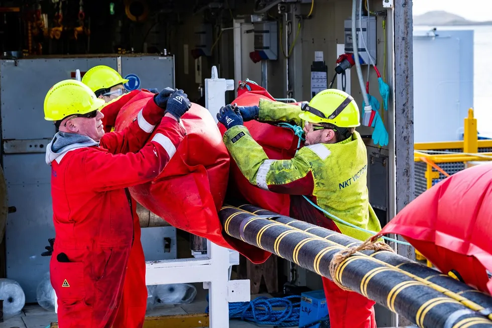 Crew onboard the NKT Victoria prepares the cable for deployment in the Shetland HVDC Link.