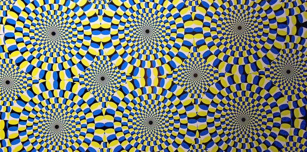 As you move your eyes around this still image, the circles seem to rotate.