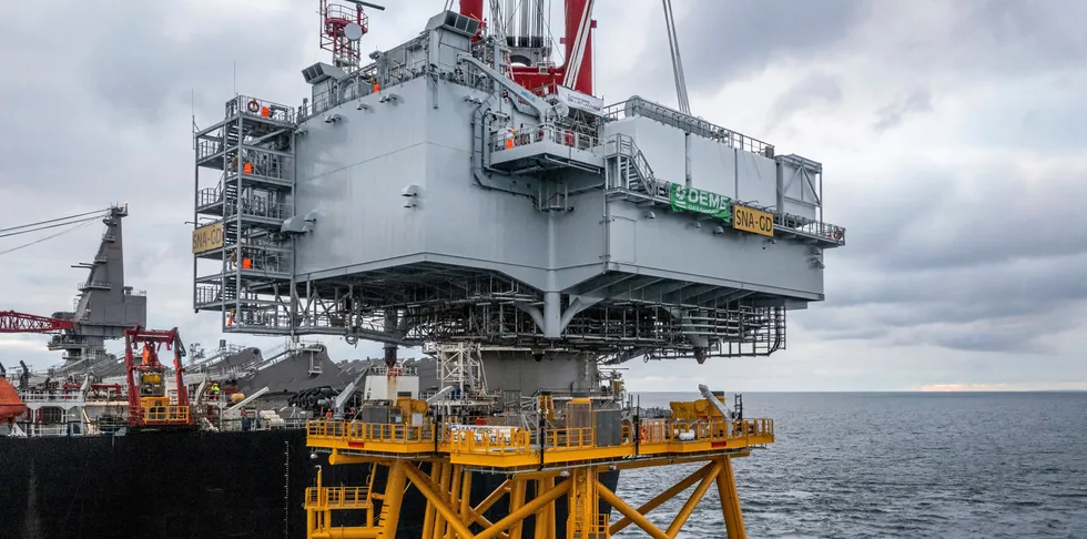 DEME installation vessel mates substation topsides with jacket at Saint-Nazaire wind farm off France