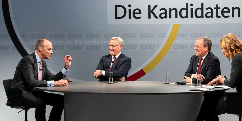 (L-R) Friedrich Merz, Norbert Roettgen and Armin Laschet, the three current candidates vying for the leadership post of the German Christian Democrats (CDU), and moderator Tanja Samrotzki