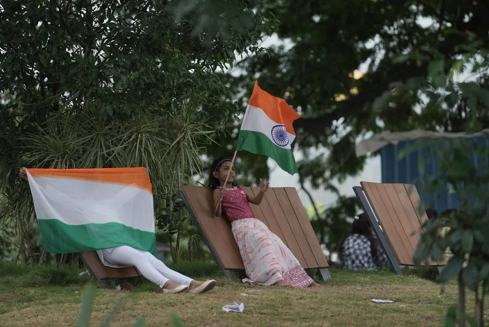 A child waves an Indian flag during Independence Day celebrations in Hyderabad, India, on 15 August 2024.
