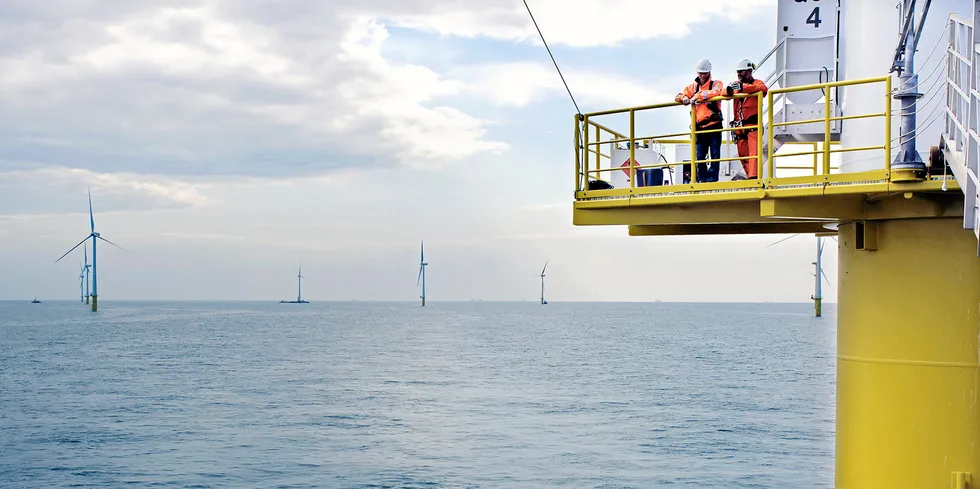 Two workers at an offshore wind farm in the North Sea. Photo: Vattenfall . Workers at a Dutch offshore wind farm