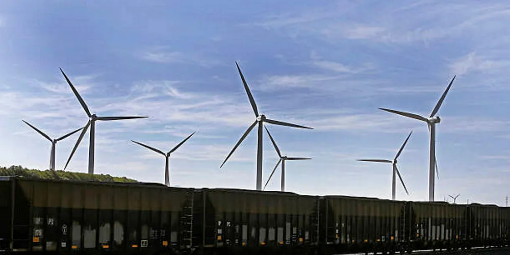 Fossil fuel consumption continues to decline in the US electric power sector, reducing coal-carrying trains such as the one pictured.