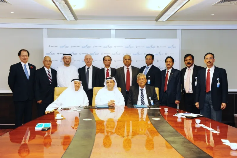 Dolphin Energy’s general managers in the UAE and Qatar, Ibrahim Ahmed Al Ansaari and Adel Ahmed Albuainain are pictured with Larsen & Toubro’s chief executive K Venkataramanan (front row)