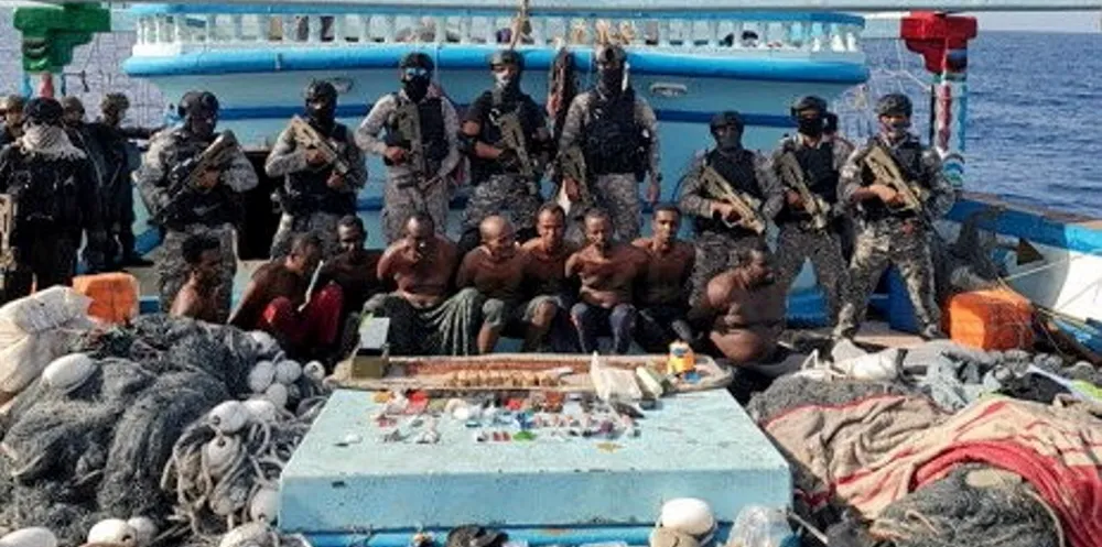 Indian Navy with a group of pirates captured in the Arabian Sea.