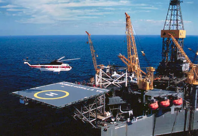 Exit strategy: companies working in the Gulf of Mexico were evacuating workers from offshore rigs today