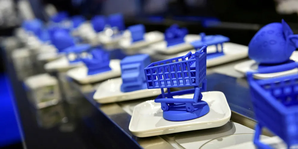 A conveyor belt with objects is used to demonstrate blockchain technology at the IBM booth at CES 2019 at the Las Vegas Convention Center in January.