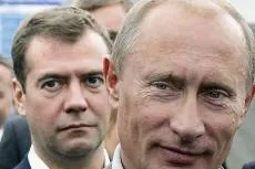 Putting on the squeeze: Vladimir Putin (front) and Dmitry Medvedev unveil import bans