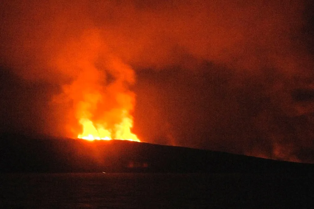 There she blows: lava flows and clouds of smoke and ash reach skyward after a volcano eruption on the island of Jazirt Atta-Ir in the Red Sea