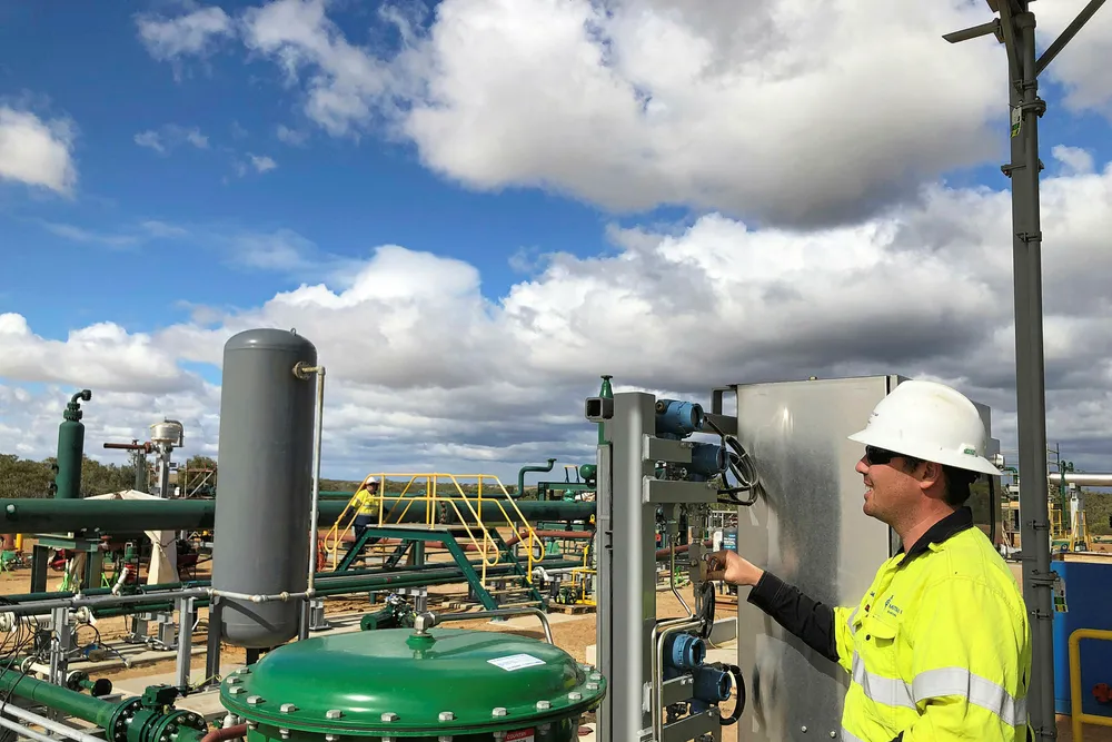 Happy days: a worker at the Xyris production facility, the hub of the Waitsia stage one project in Western Australia