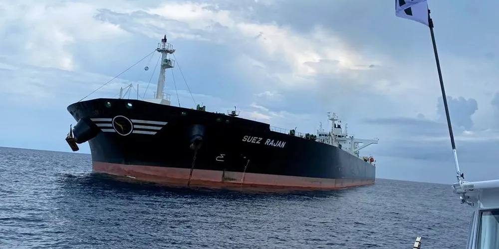 The United Against Nuclear Iran flag flies near the Suez Rajan. The ship spent months anchored off Texas after it was seized.