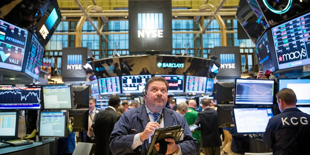 Traders work on the floor of the New York Stock Exchange.