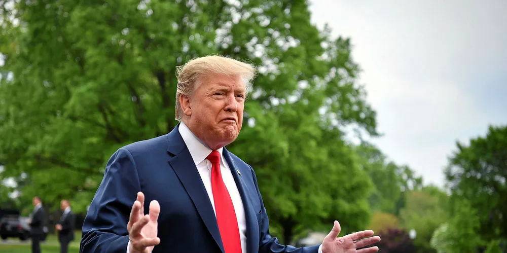 US President Donald Trump speaks to reporters.