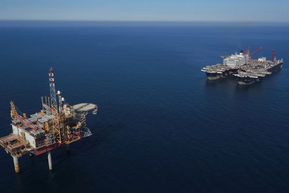Ready to lift: the Pioneering Spirit lines up near the Yme platform earlier this year