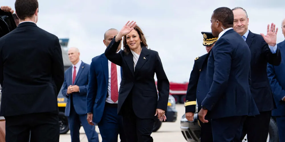 US vice president Kamala Harris and second gentleman Douglas Emhoff descend from Air Force Two at Delaware National Air Guard base in New Castle, Delaware, on Monday. Harris is set to meet campaign staff in Wilmington.