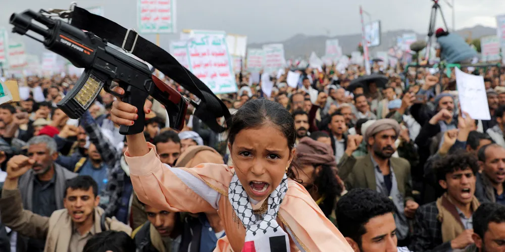 A girl shouts slogans during a rally by mainly Houthi supporters against Israel’s Gaza offensive.