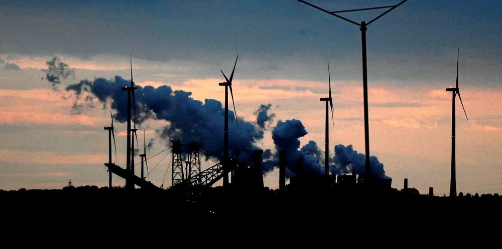 Coal-fired power plants and wind turbines of German energy giant RWE are seen at the Garzweiler lignite opencast mine in Jackerath.