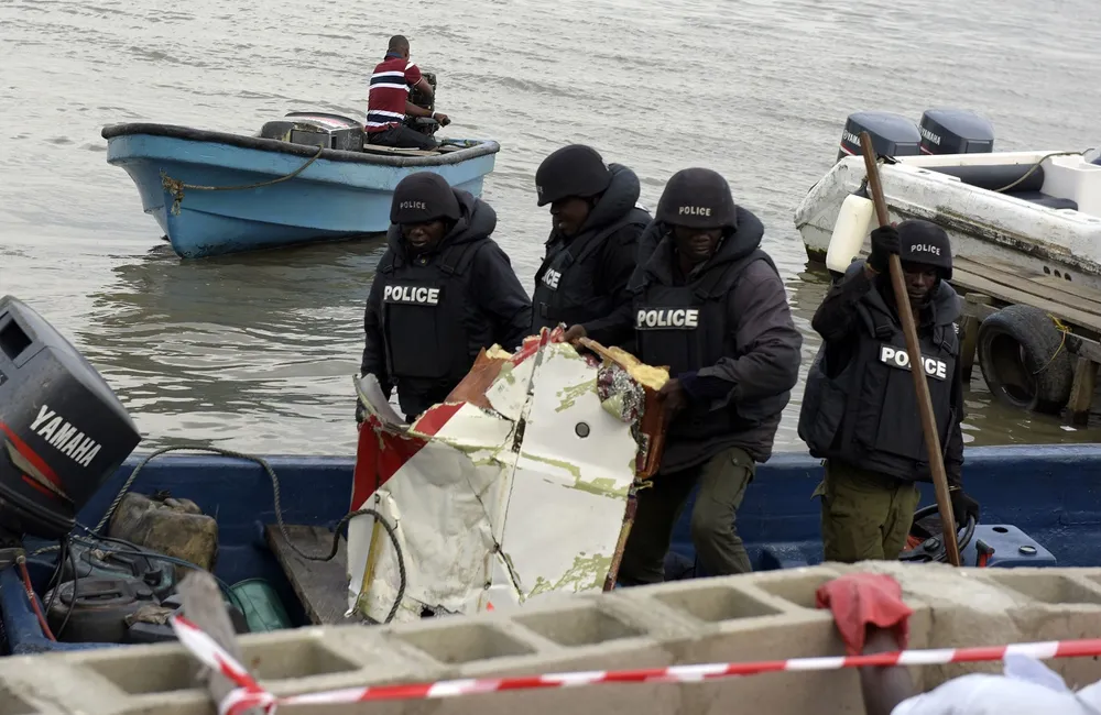 Wreckage: Nigerian responders recover remnants of helicopter from water