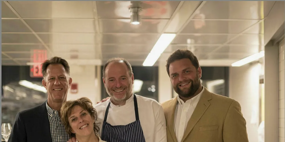 Three-star Michelin Chef Michael Tusk of Quince in San Francisco, center, and Boston restaurateur and James Beard Award winner Barbara Lynch, front, take a photo op with Michael Goldman, founder of Haute Life Press, left, and Browne Trading CEO Jack Lombard.