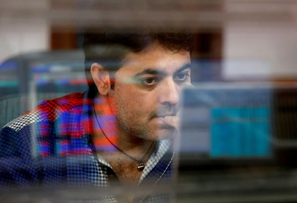 OIL PRICE UP: A broker watches as oil prices rose more than 2% on Wednesday