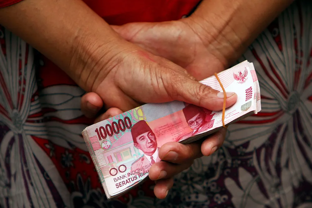 Cash in the hand: in Indonesia