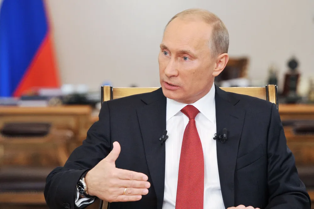 Shake on it: Technip's agreements came during meetings between Vladimir Putin and French President Francois Hollande