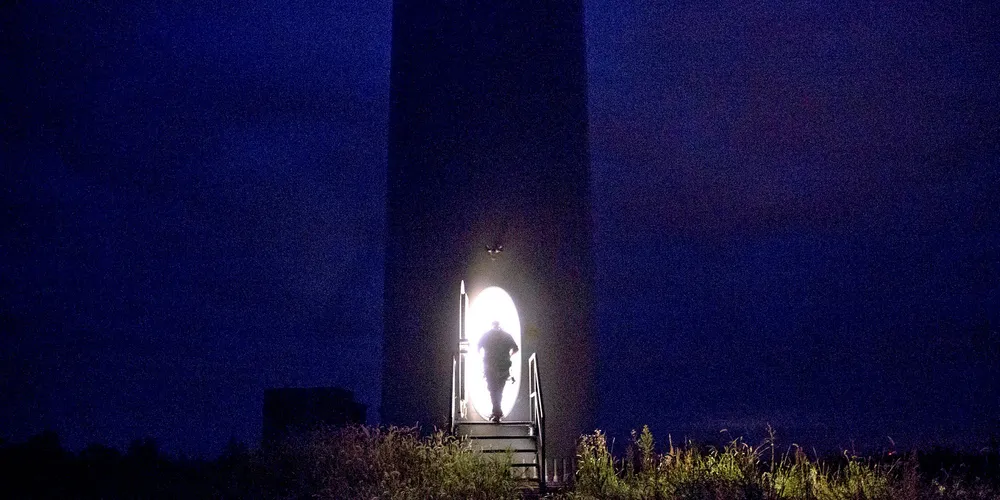 A technician enters a GE wind turbine in Greenfield, Iowa. Pic : Daniel Acker/Bloomberg