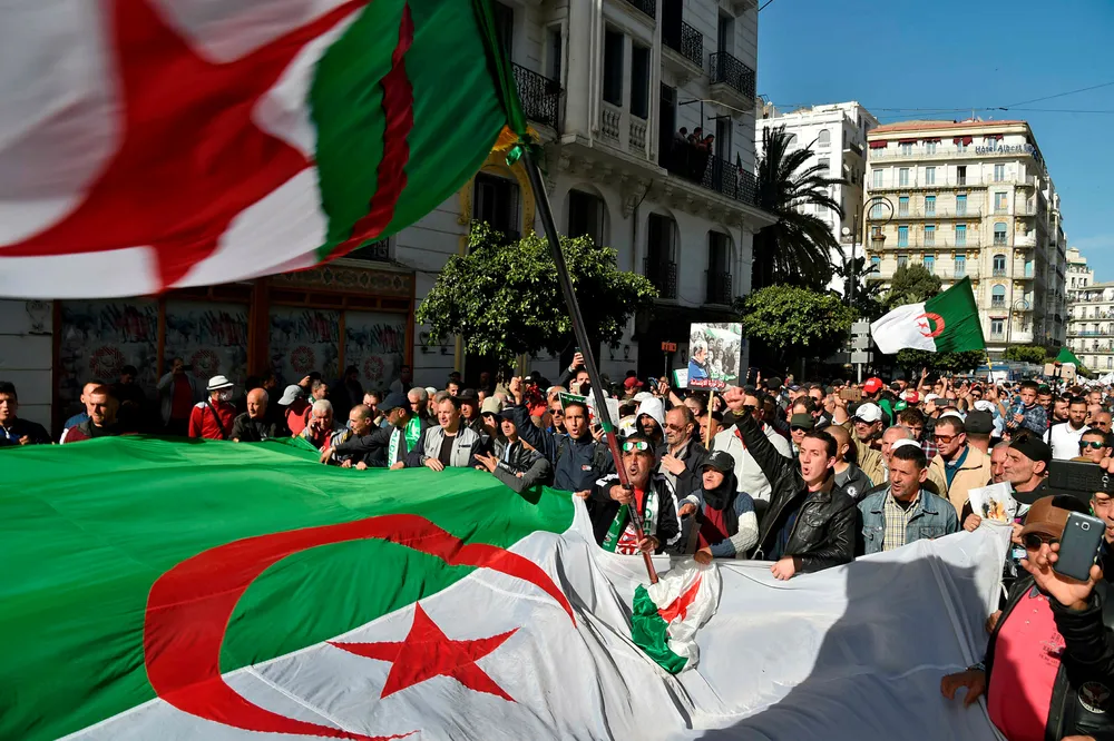 Turbulence: Algerian demonstrators in response to President Abdelaziz Bouteflika announcing he intended to run for a fifth term