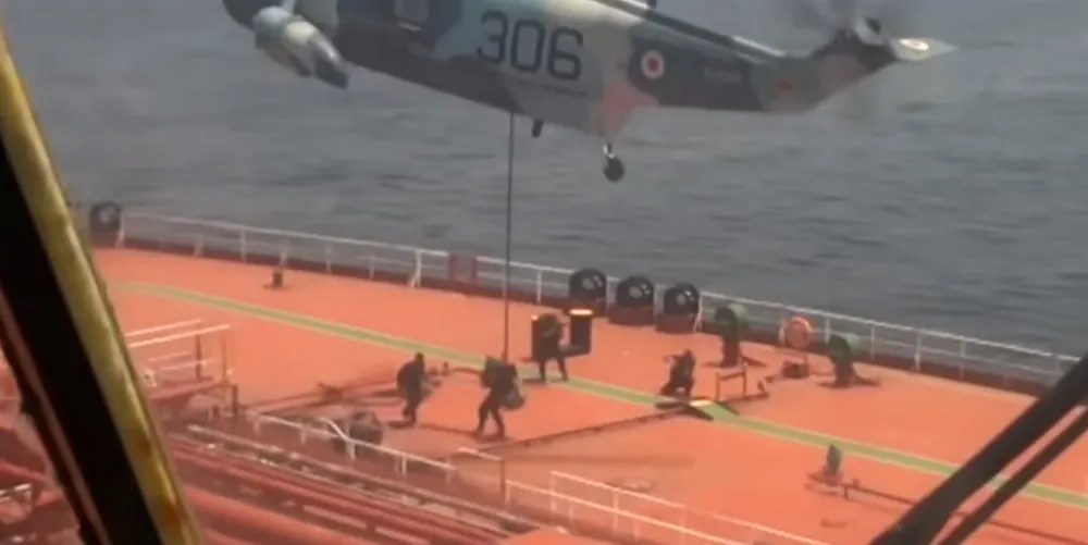 Iranian forces land on the deck of the Advantage Sweet.
