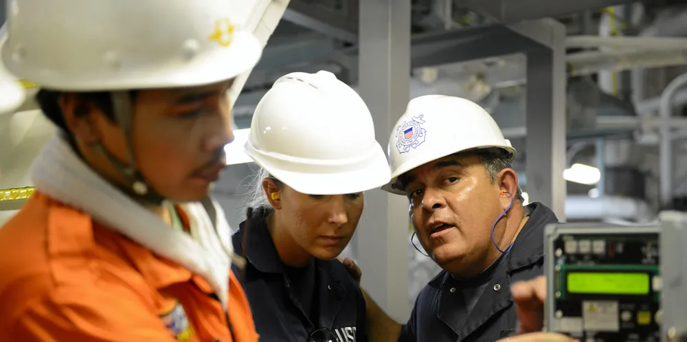 Port state control officers at work on a Panamanian-flagged bulker in Hawaii.