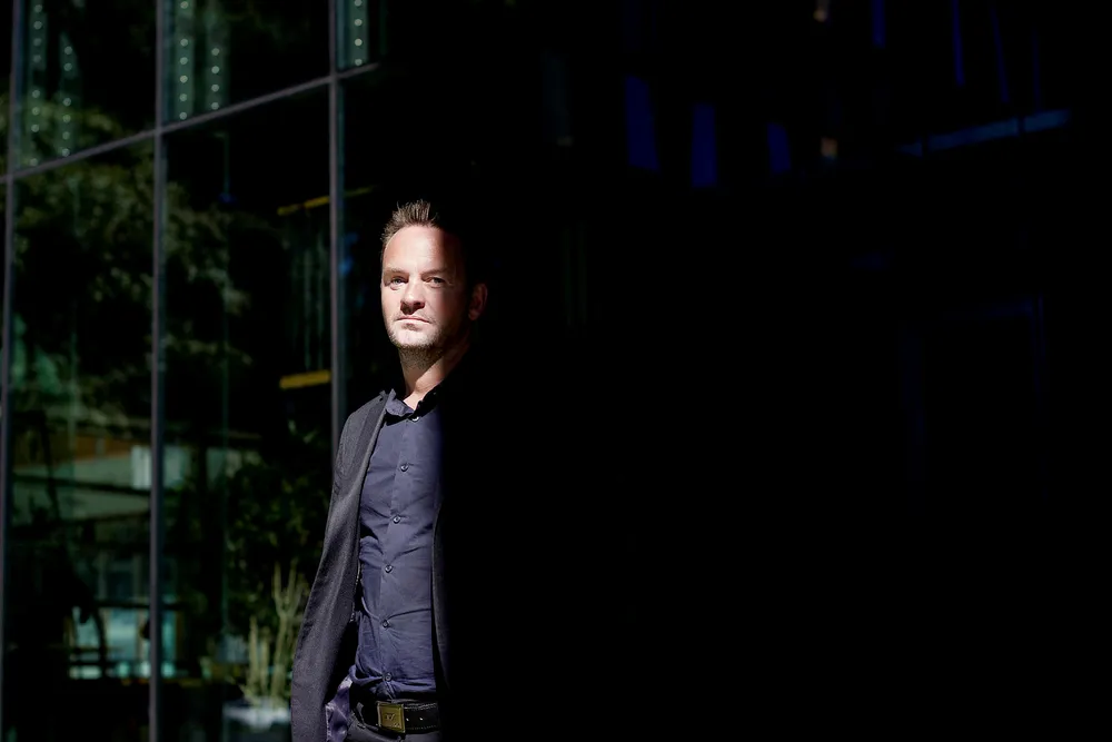Sjømat Norge-sjefen Geir Ove Ystmark mener særskatt på oppdrettsnæringen kan føre til at industrien blir flagget ut.