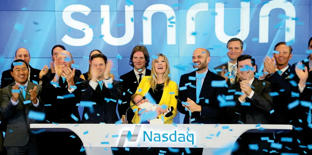 Sunrun CEO Lynn Jurich rings the bell at the Nasdaq stock exchange