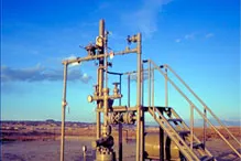 Pumping out profits: Questar production facility in the Rockies