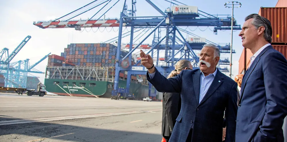 On site: California governor Gavin Newsom (right) tours the Port of Los Angeles. The state government is considering an in-transit rule for shipping