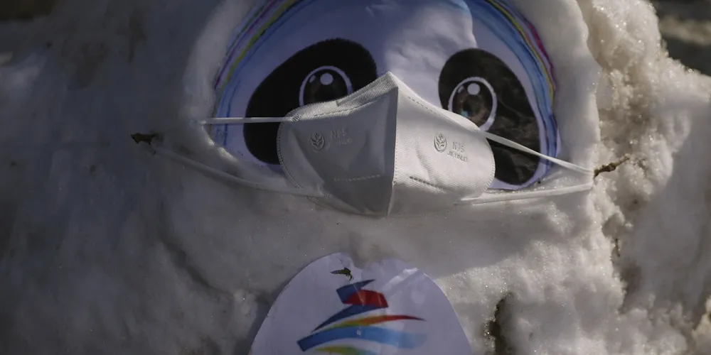 The Beijing 2022 Winter Olympics mascot Bing Dwen Dwen wears a mask in support of China’s zero Covid policy.