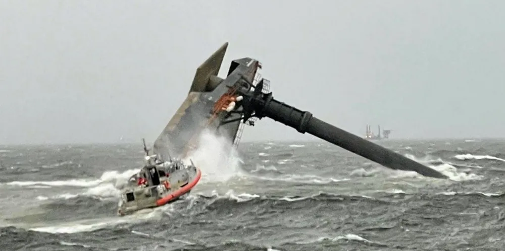 Emergency crews respond to the 2,300-gt Seacor Power (built 2002) after it capsized in the Gulf of Mexico in 2021. The ship was owned by Seacor Marine.