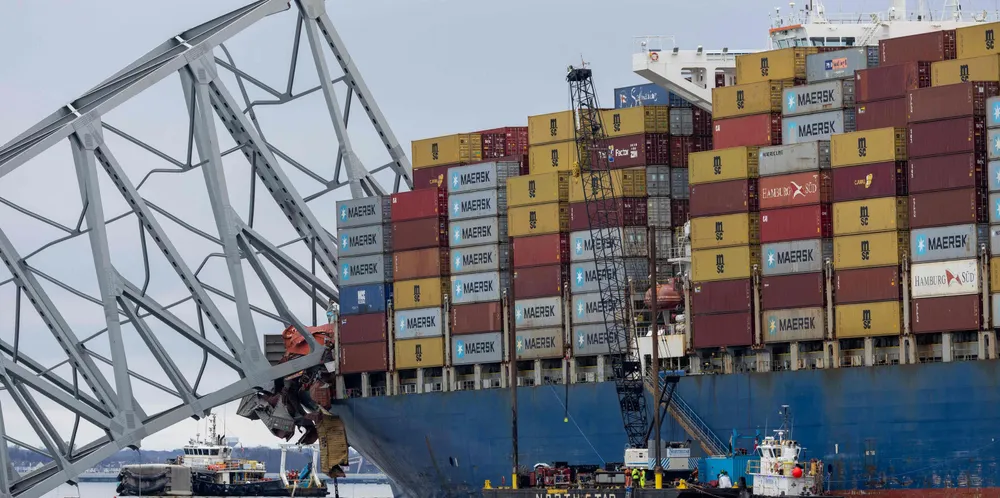 : Wreckage from the collapsed Francis Scott Key Bridge rests on the cargo ship Dali efforts begin to clear the debris and reopen the Port of Baltimore