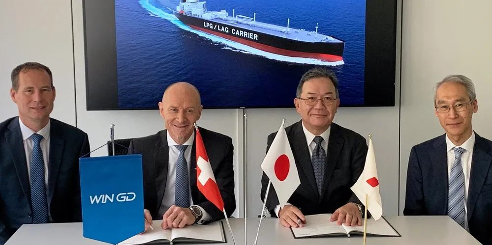 From left, WinGD’s Dominik Schneiter, vice president of R&D, and CEO Klaus Heim; and Mitsubishi Shipbuilding CEO Toru Kitamura and Manabu Kawakado, executive director, head of marine engineering centre.