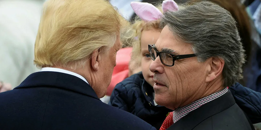 US President Donald Trump speaks with Secretary of Energy Rick Perry.