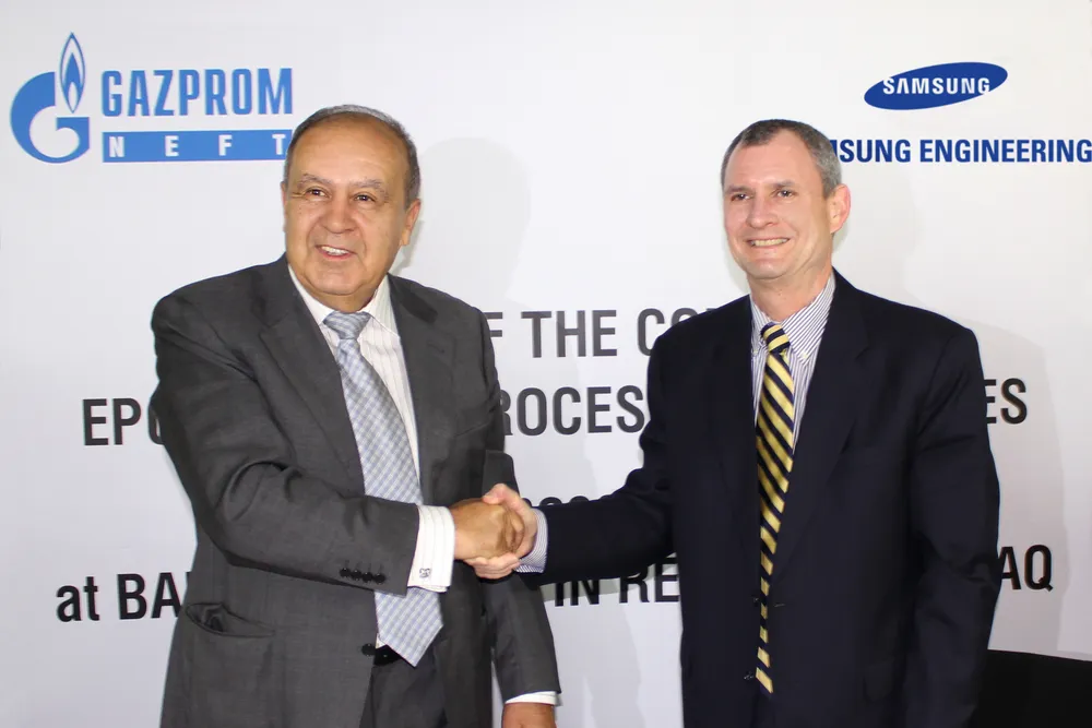 New deal: Gazprom Neft's Badra project director, Alexander Kolomatsky (left), shakes hands with Samsung Engineering senior executive vice president of marketing, Steve Fludder (right).