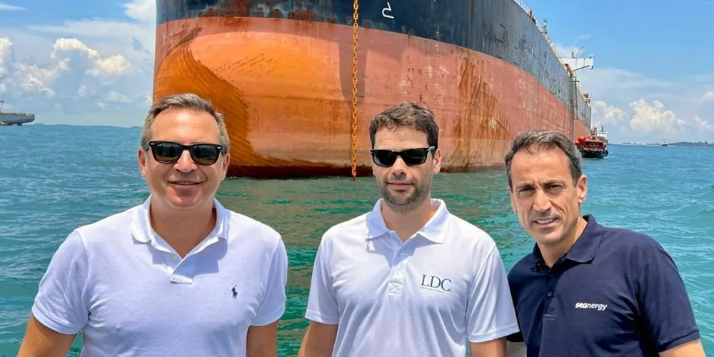 Seanergy Maritime CEO Stamatis Tsantanis (left) and colleagues visiting one of the company’s ships off Singapore earlier this week.